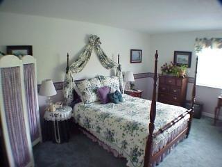1502 Golf Course Drive Rohnert Park, CA 94928 - Photo 8 of 11 a bedroom with a bed table and a window