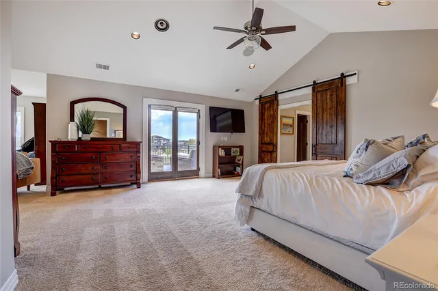 a bathroom with a toilet a sink and a mirror