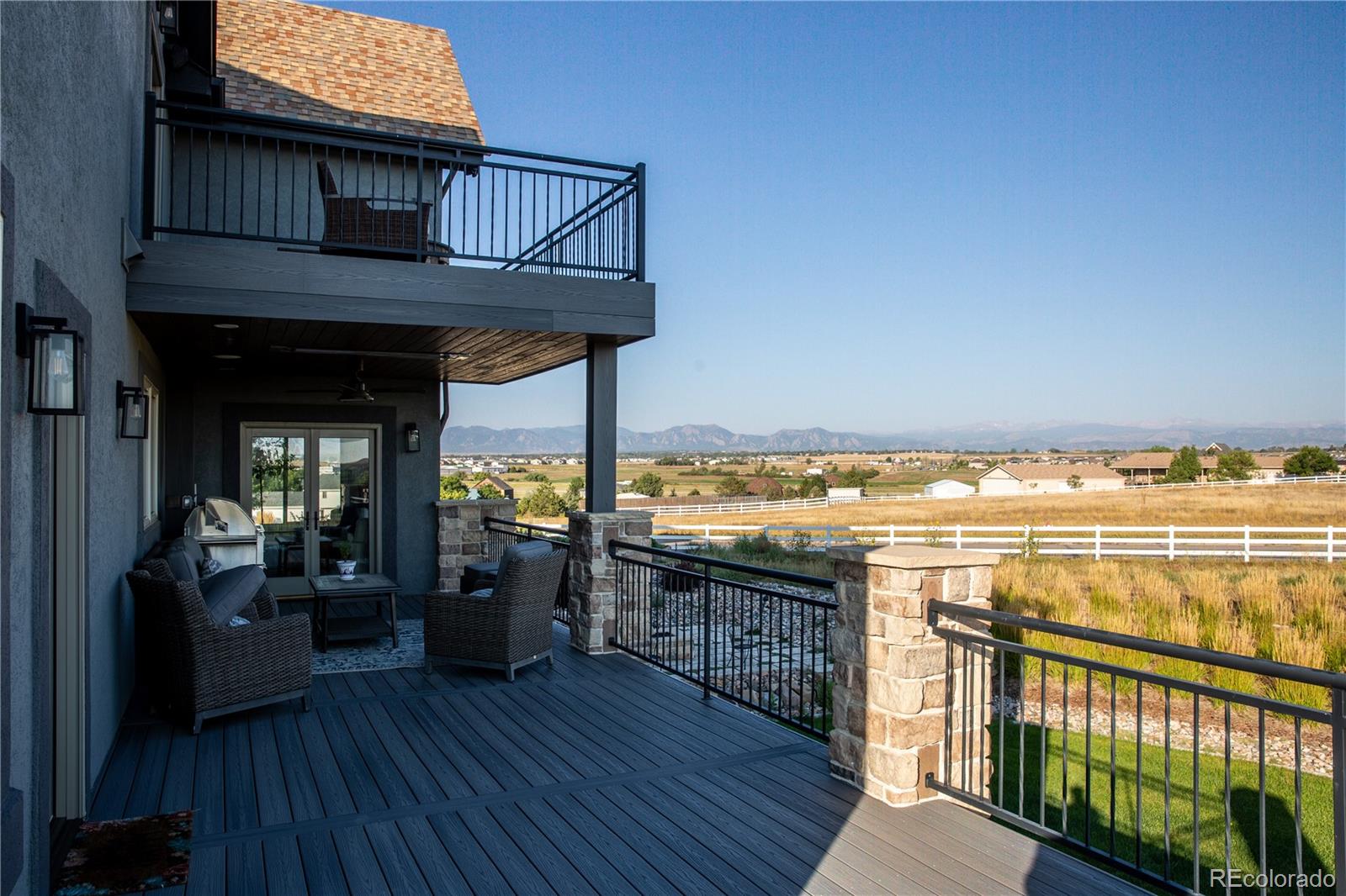147 Commander Drive Erie, CO 80516 - Photo 34 of 50 a view of a house and ocean from a balcony