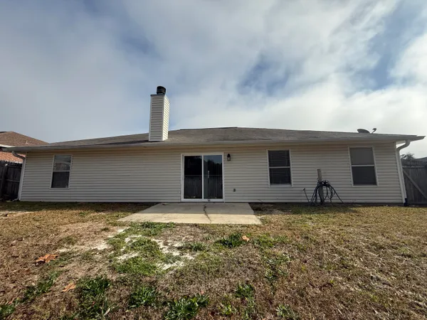 a house that has a window in front of it