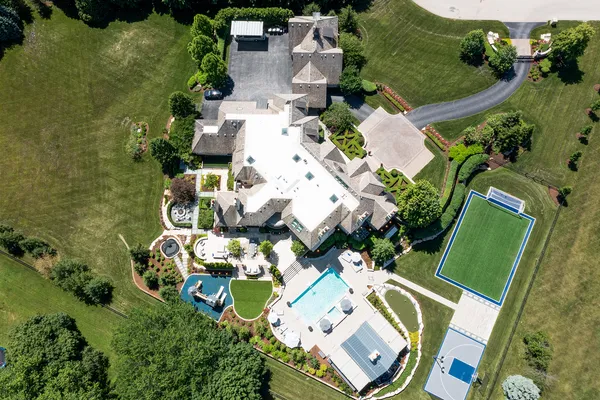 a view of a house with backyard porch and patio