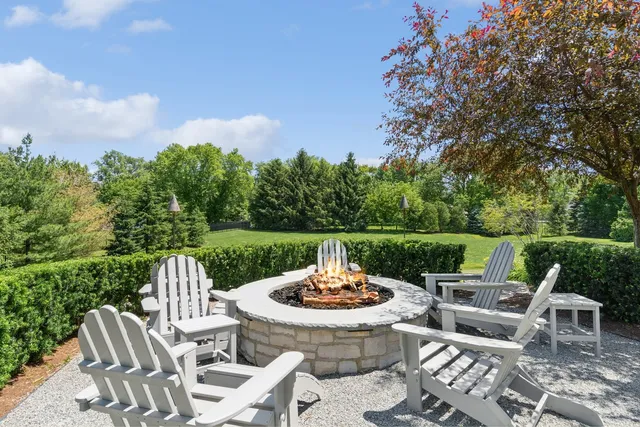 a front view of a house with a fireplace