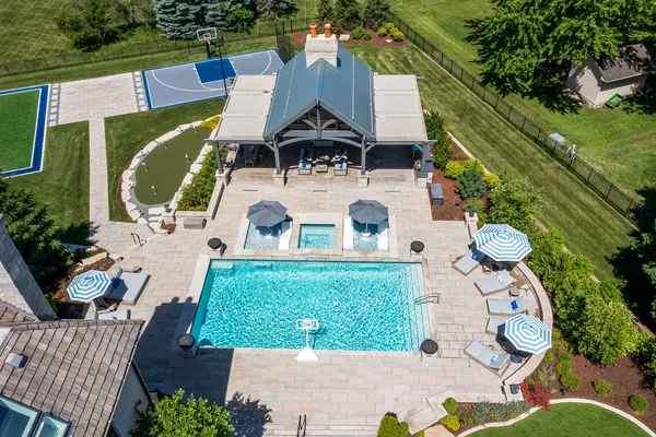 an aerial view of multiple house with yard
