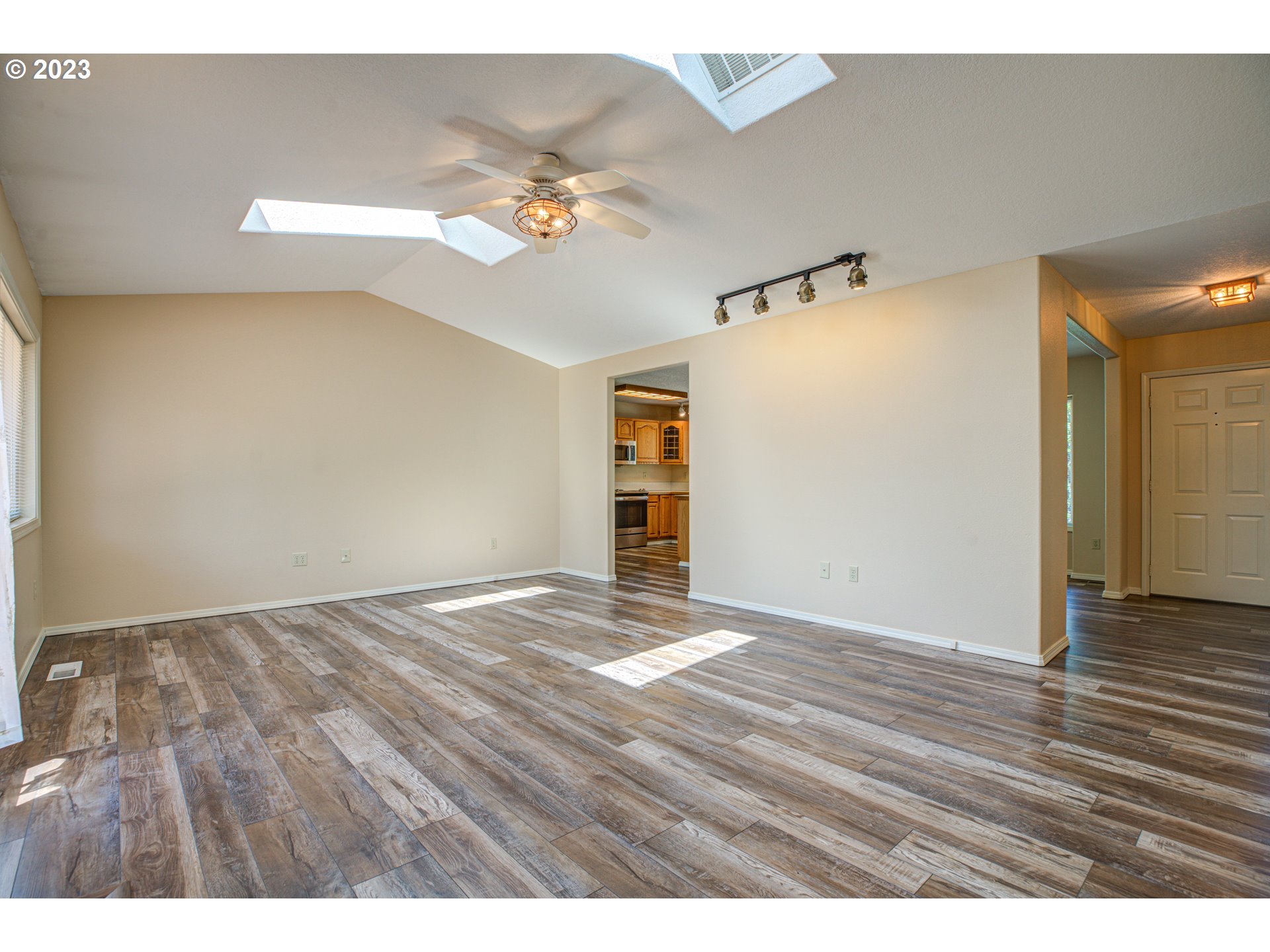 4523 Southeast Hill Road Milwaukie, OR 97267 - Photo 16 of 48 a view of an empty room with wooden floor