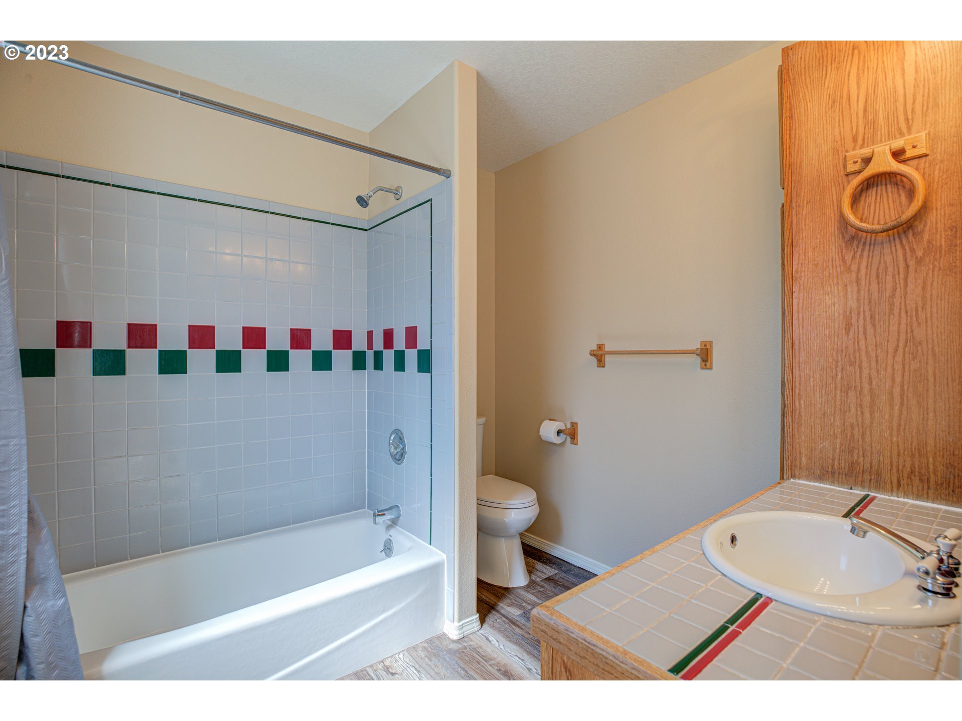 4523 Southeast Hill Road Milwaukie, OR 97267 - Photo 28 of 48 a bathroom with a sink a toilet and shower