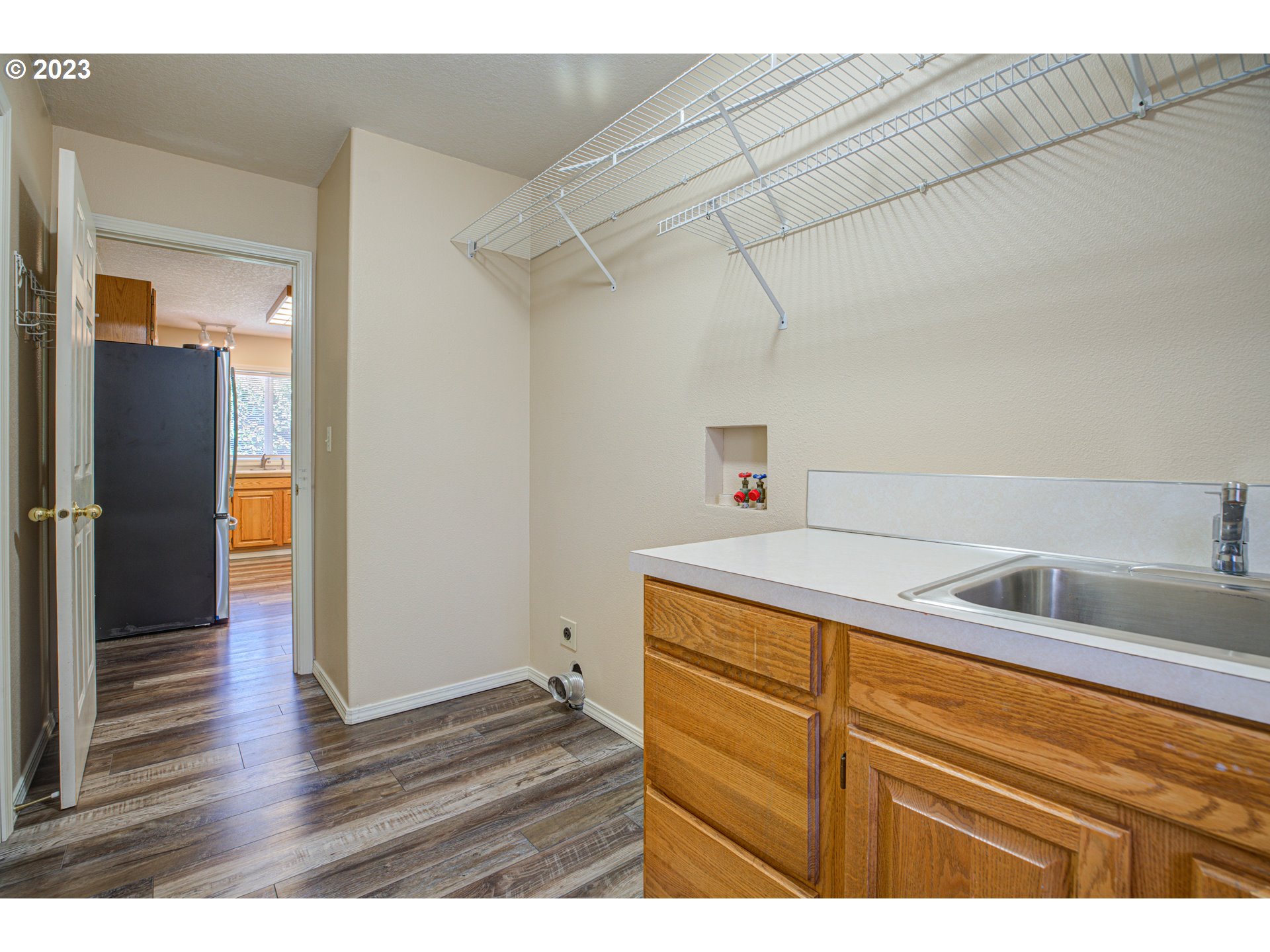 4523 Southeast Hill Road Milwaukie, OR 97267 - Photo 31 of 48 a kitchen with a wooden floor and sink