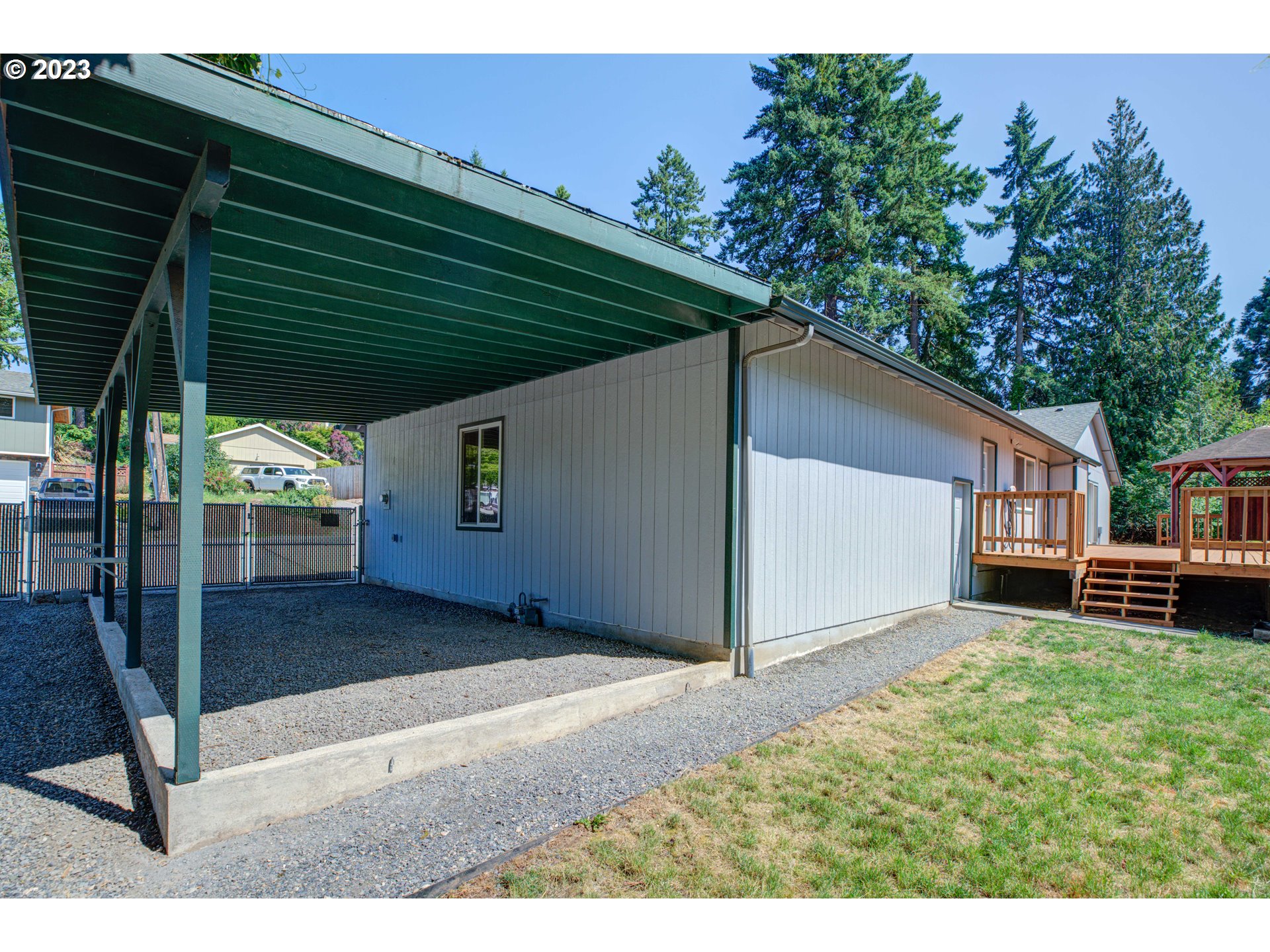 4523 Southeast Hill Road Milwaukie, OR 97267 - Photo 39 of 48 a view of a backyard with a garden and deck