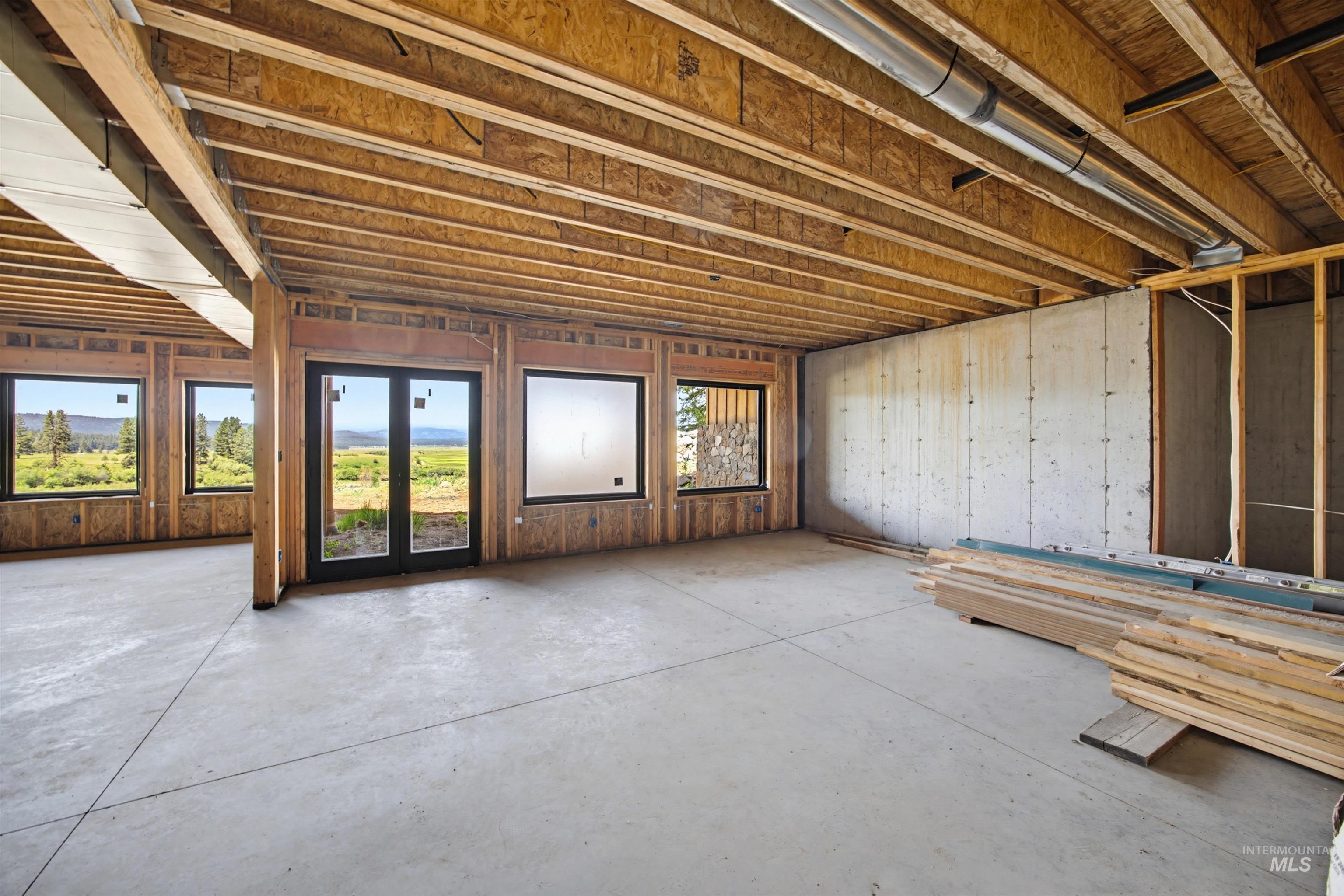 3322 Big Creek Road New Meadows, ID 83654 - Photo 25 of 50 Unfinished interior with exposed wood framing and concrete flooring