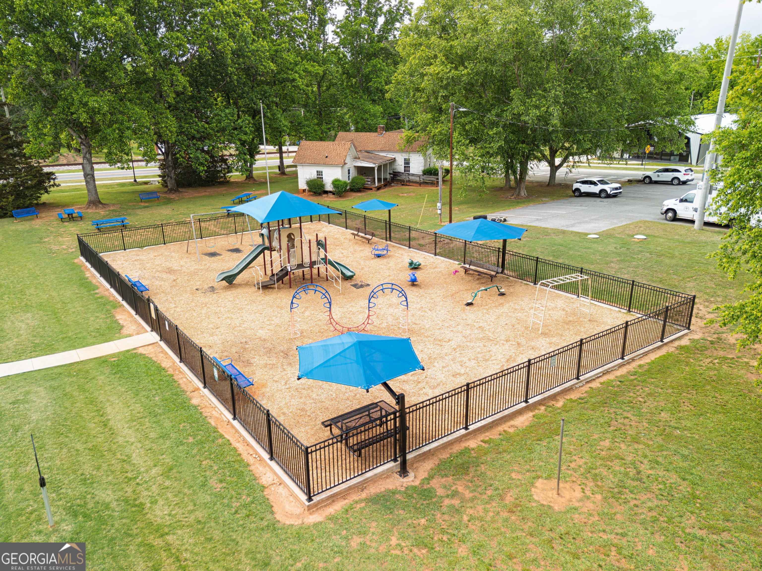 418 Lamb Road Moreland, GA 30259 - Photo 29 of 32 a swimming pool with outdoor seating and yard