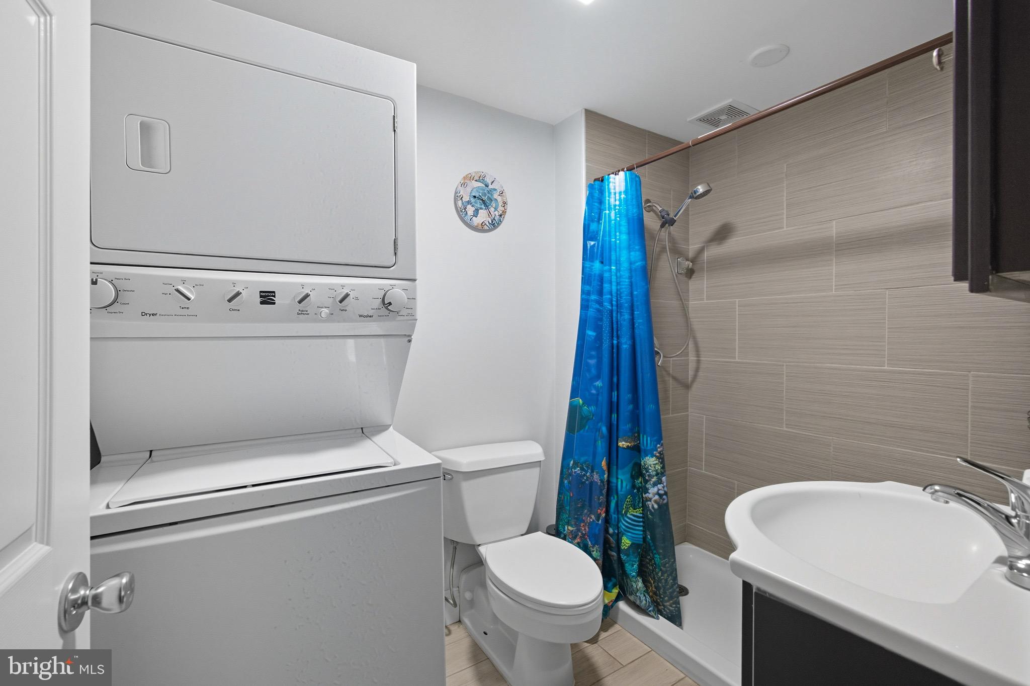 687 Jackson Road Atco, NJ 08004 - Photo 15 of 20 a bathroom with a sink a toilet and a shower