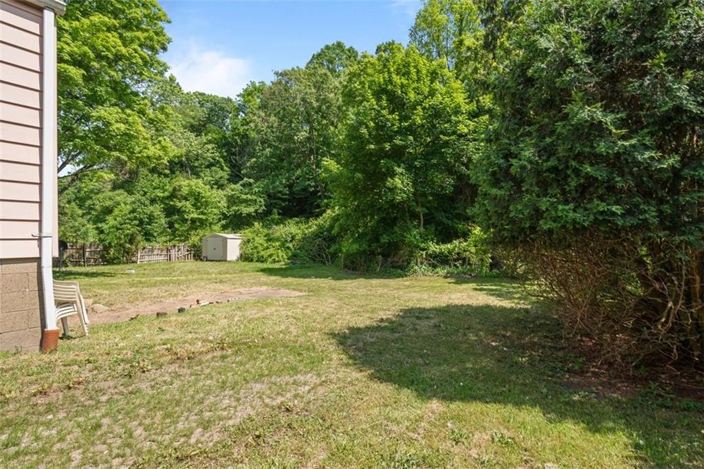 1012 Universal Road Pittsburgh, PA 15235 - Photo 12 of 13 a view of a yard with plants and trees