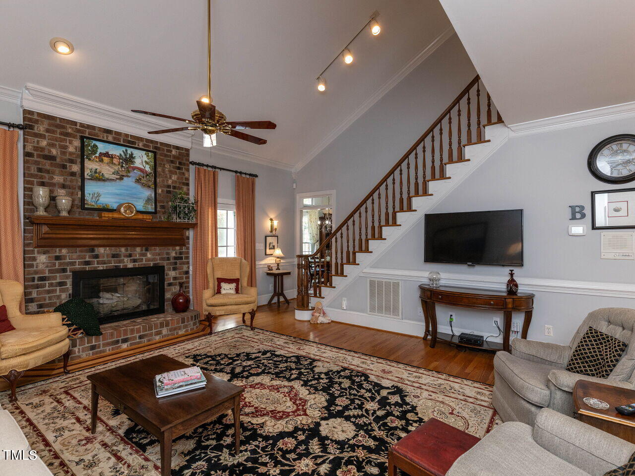 9404 Middleberry Lane Raleigh, NC 27603 - Photo 11 of 68 010-1280x960-family-room-with-fireplace