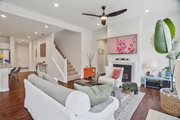 a view of living room and kitchen