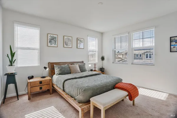 a view of a storage & utility room with closet empty shelves