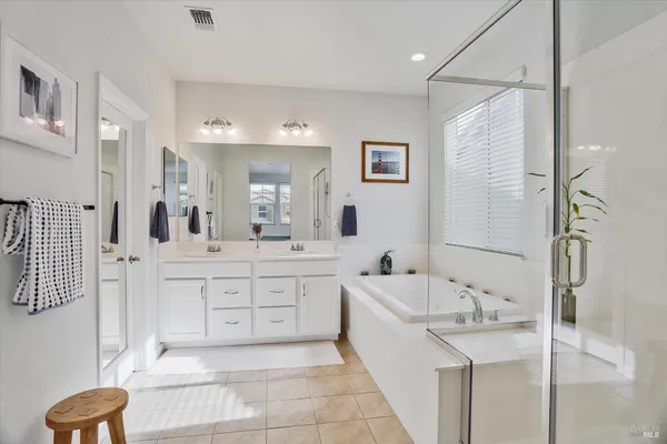 an aerial view of a house with outdoor space