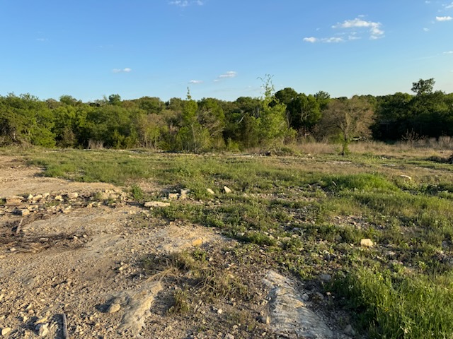 97 Rosemont Belton, TX 76513 - Photo 4 of 4 a view of a field of grass and trees