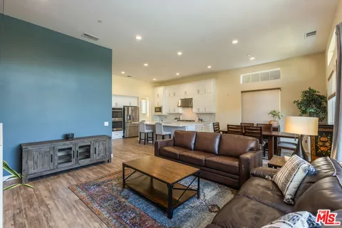 a living room with furniture and a couch