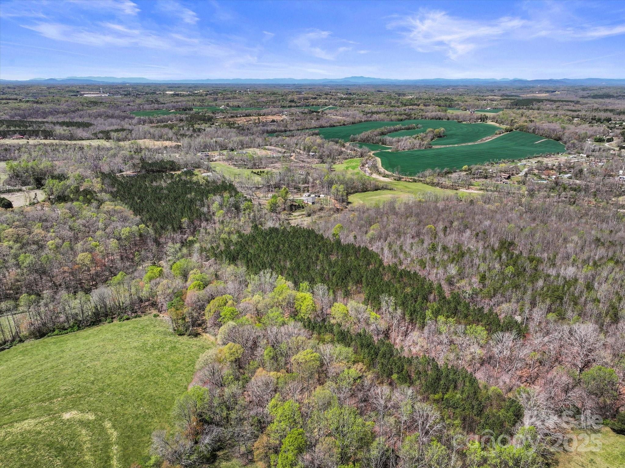 2122 Hewitt Road Claremont, NC 28610 - Photo 2 of 20 a view of a city with lots of trees
