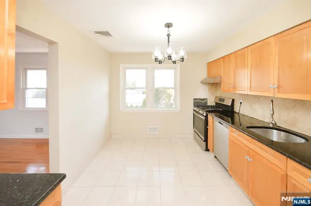 $699,000 | 113 Woods Avenue, Bergenfield, NJ 07621