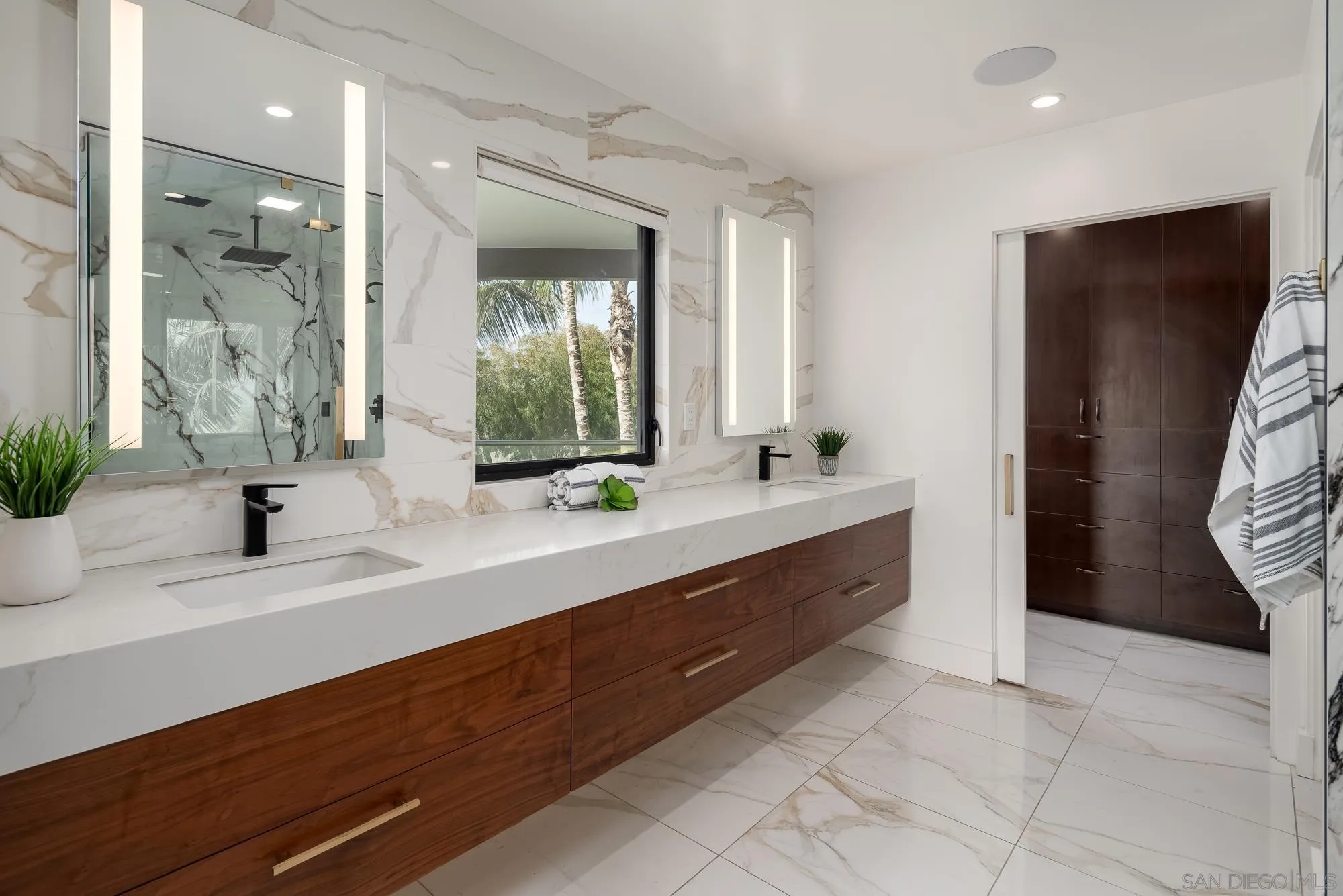 136 Verdi Avenue Cardiff, CA 92007 - Photo 13 of 27 a bathroom with a double vanity sink mirror and shower