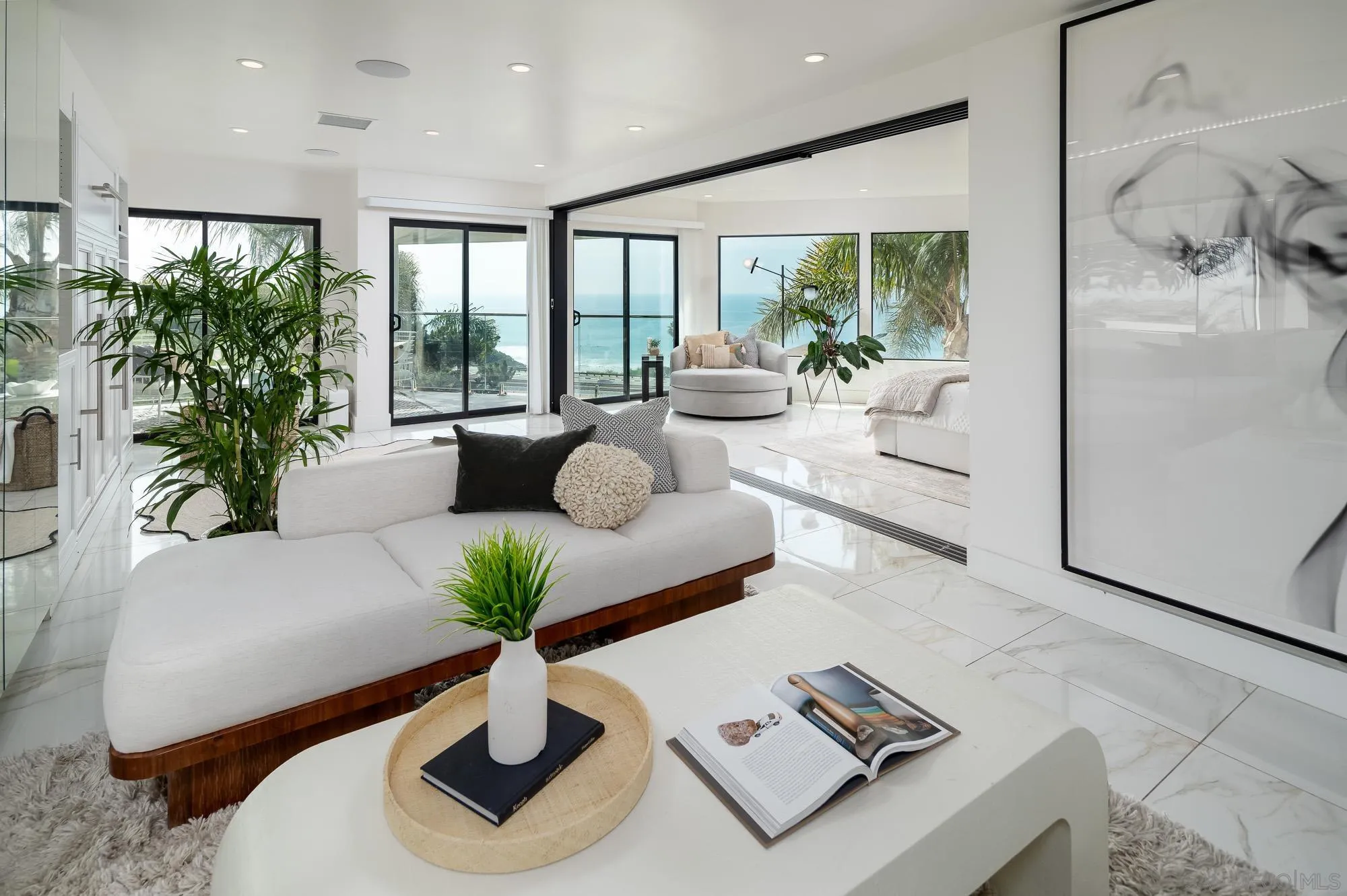 136 Verdi Avenue Cardiff, CA 92007 - Photo 16 of 27 a living room with furniture and a potted plant