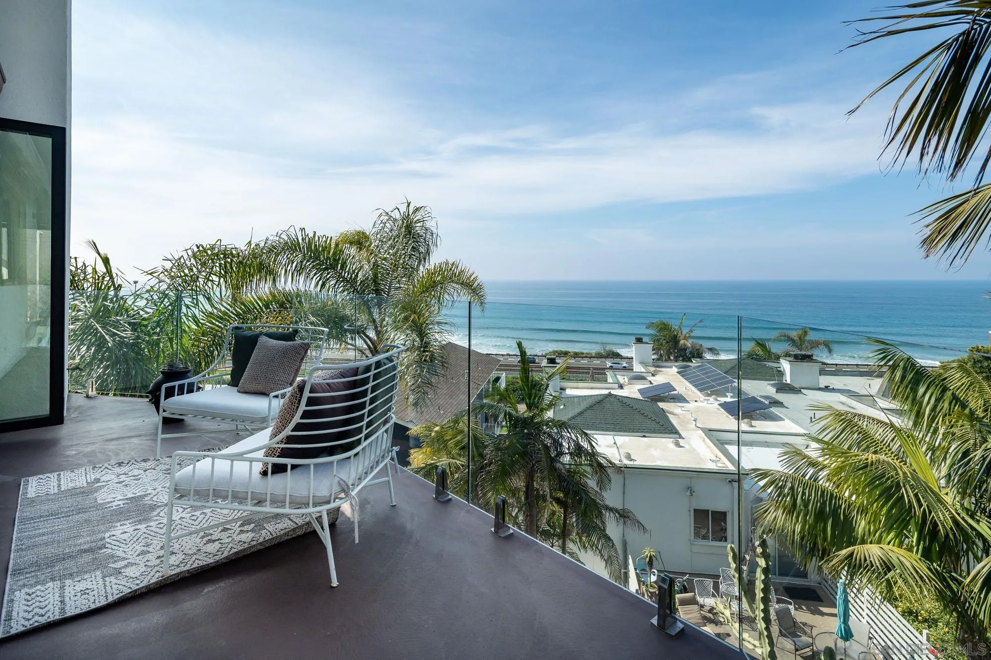 136 Verdi Avenue Cardiff, CA 92007 - Photo 18 of 27 a terrace with outdoor seating and city view
