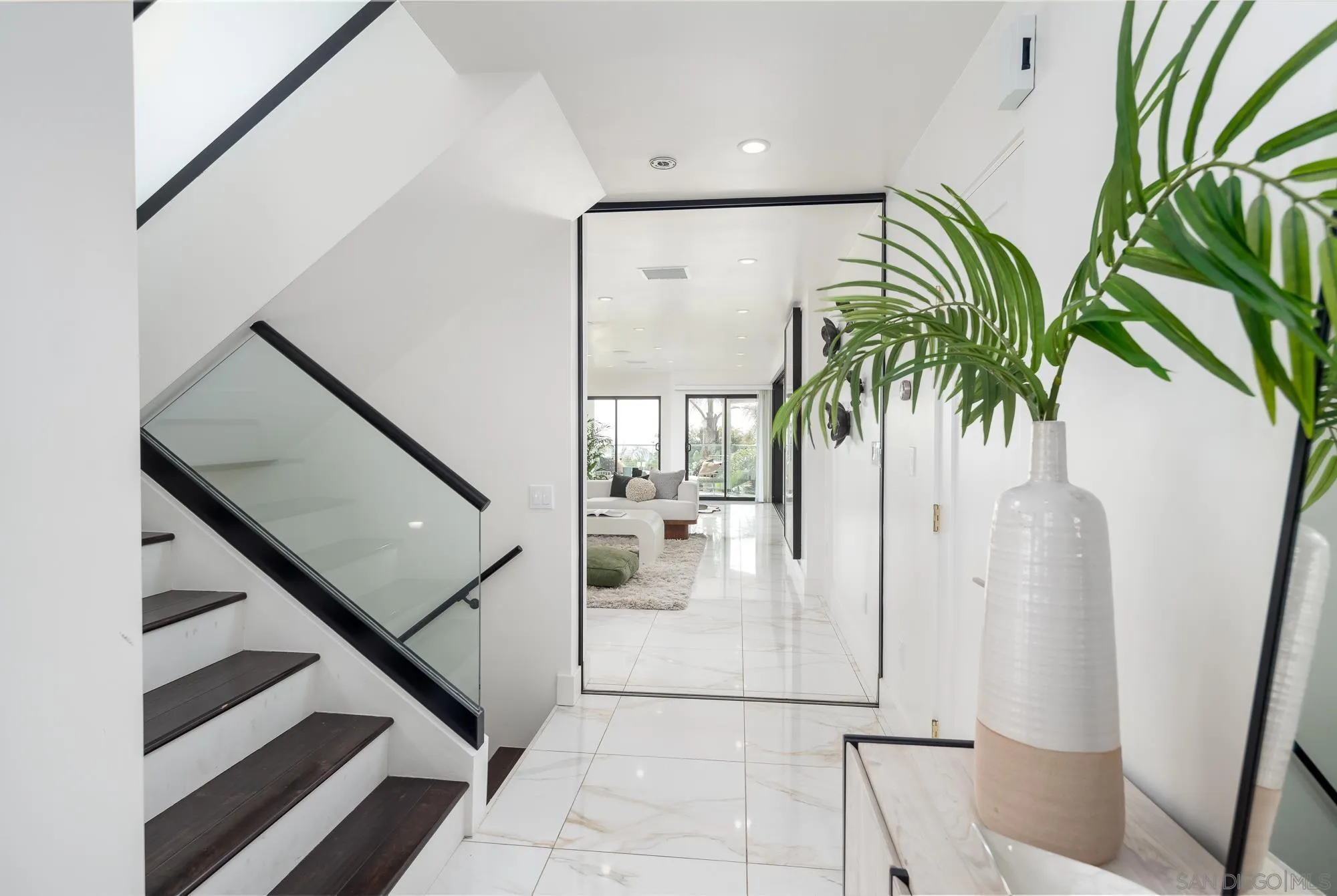 136 Verdi Avenue Cardiff, CA 92007 - Photo 20 of 27 a view of entryway with stairs and a potted plant