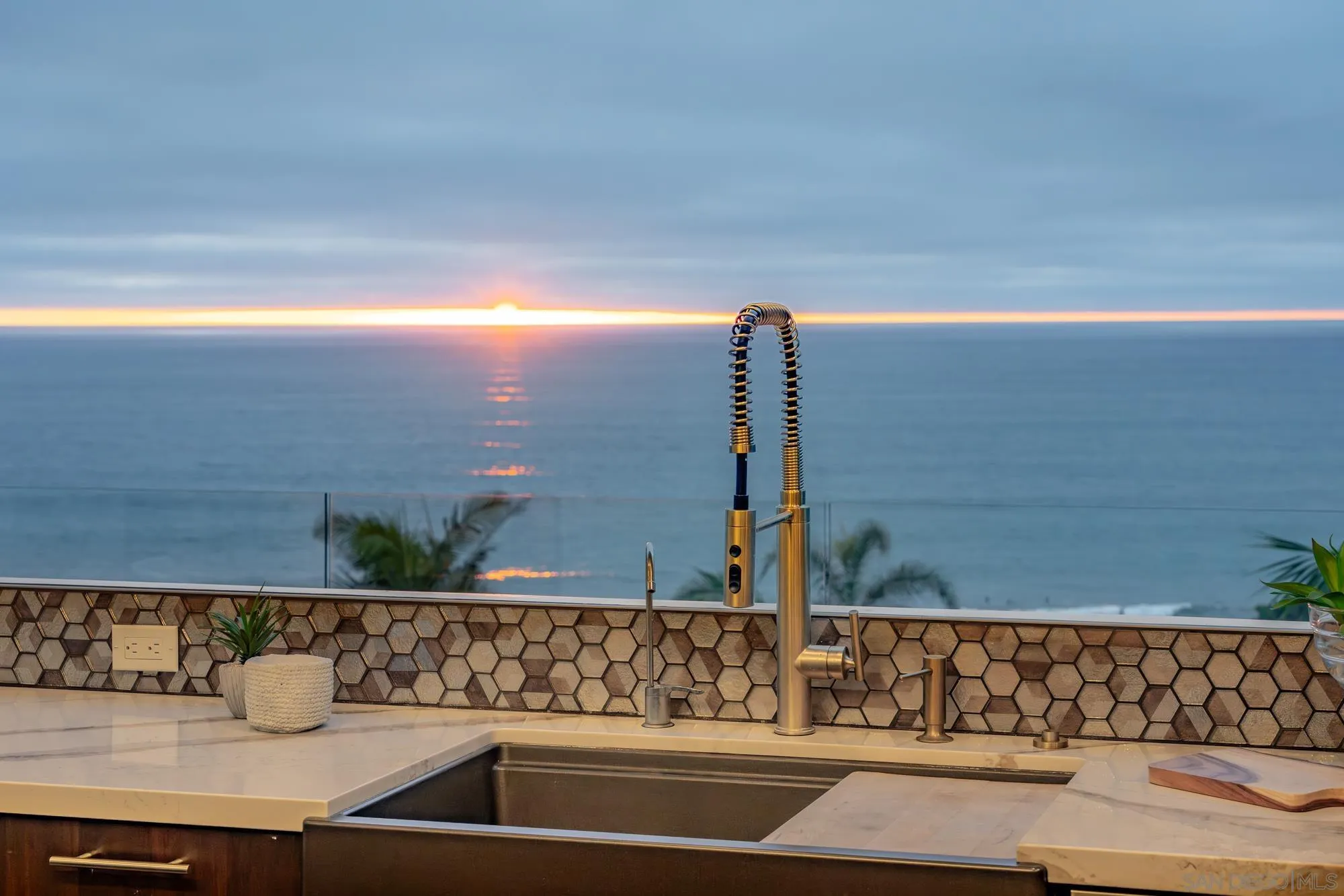 136 Verdi Avenue Cardiff, CA 92007 - Photo 2 of 27 a view of sink with glass top table and chair