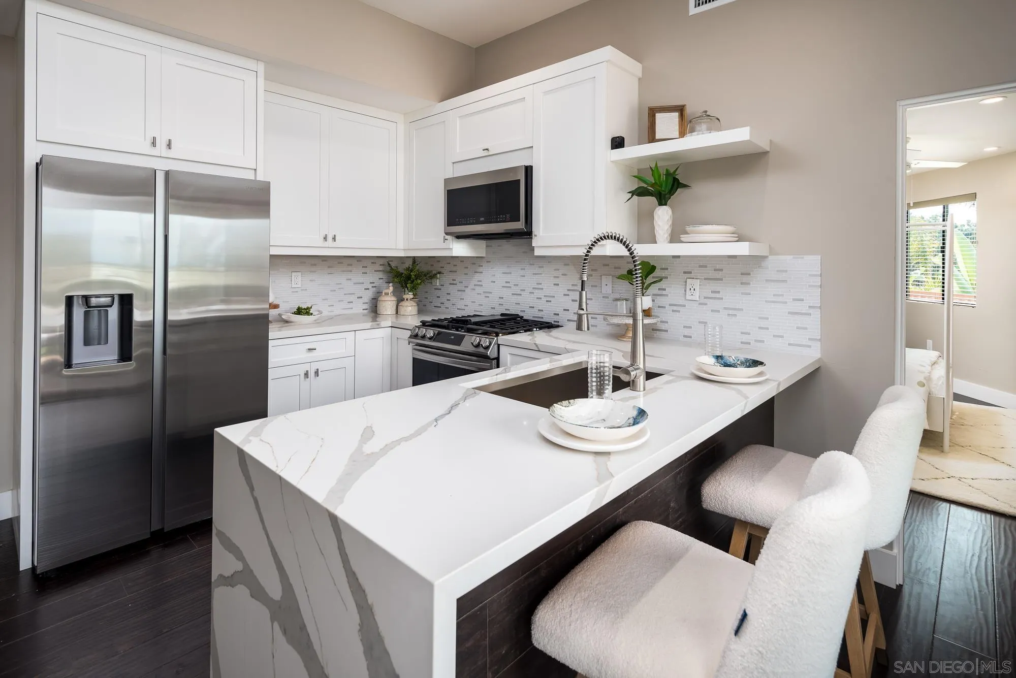 136 Verdi Avenue Cardiff, CA 92007 - Photo 24 of 27 a kitchen with stainless steel appliances a sink and microwave