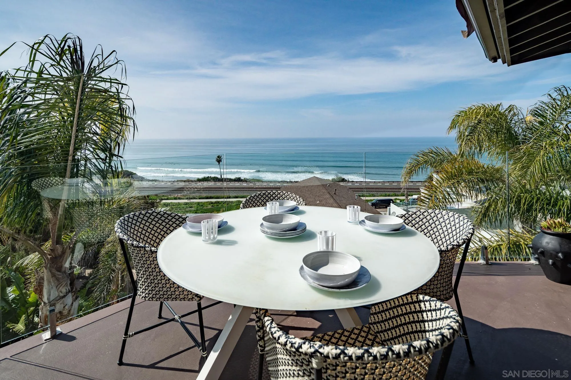 136 Verdi Avenue Cardiff, CA 92007 - Photo 4 of 27 a view of a swimming pool with a table and chairs