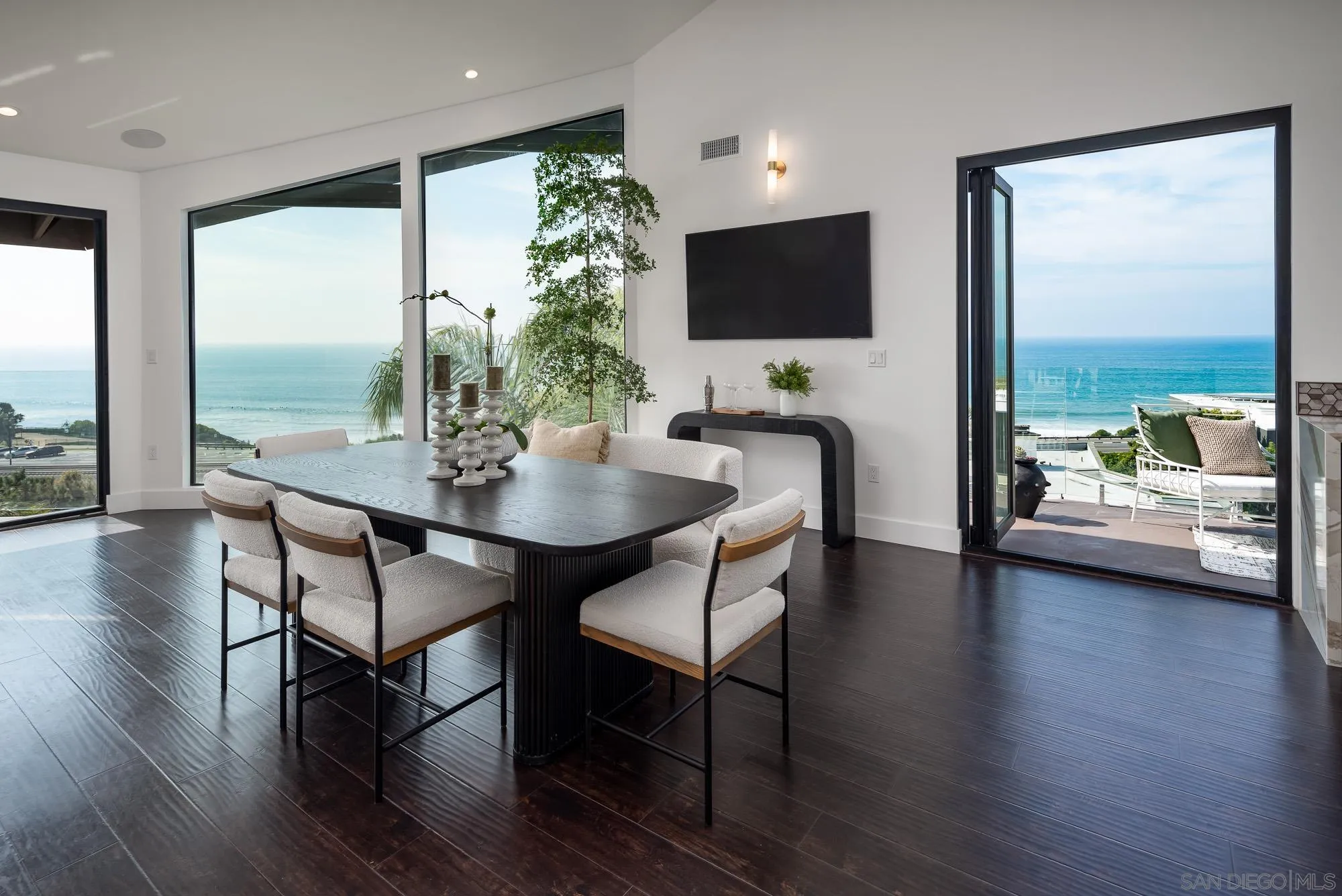 136 Verdi Avenue Cardiff, CA 92007 - Photo 5 of 27 a view of a dining room with furniture and wooden floor