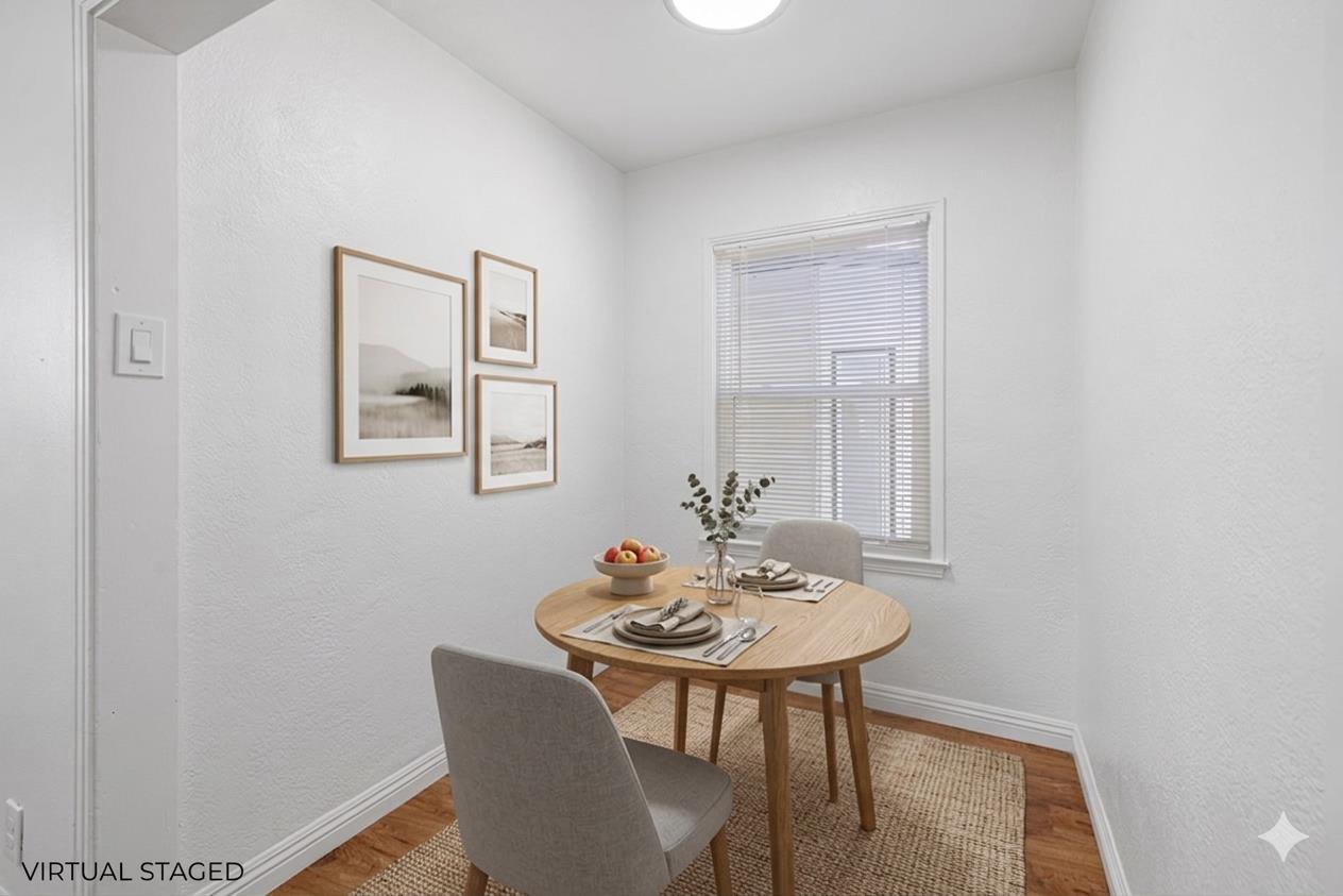 210 East Bush Street Lemoore, CA 93245 - Photo 15 of 42 a dining room with furniture and a mirror