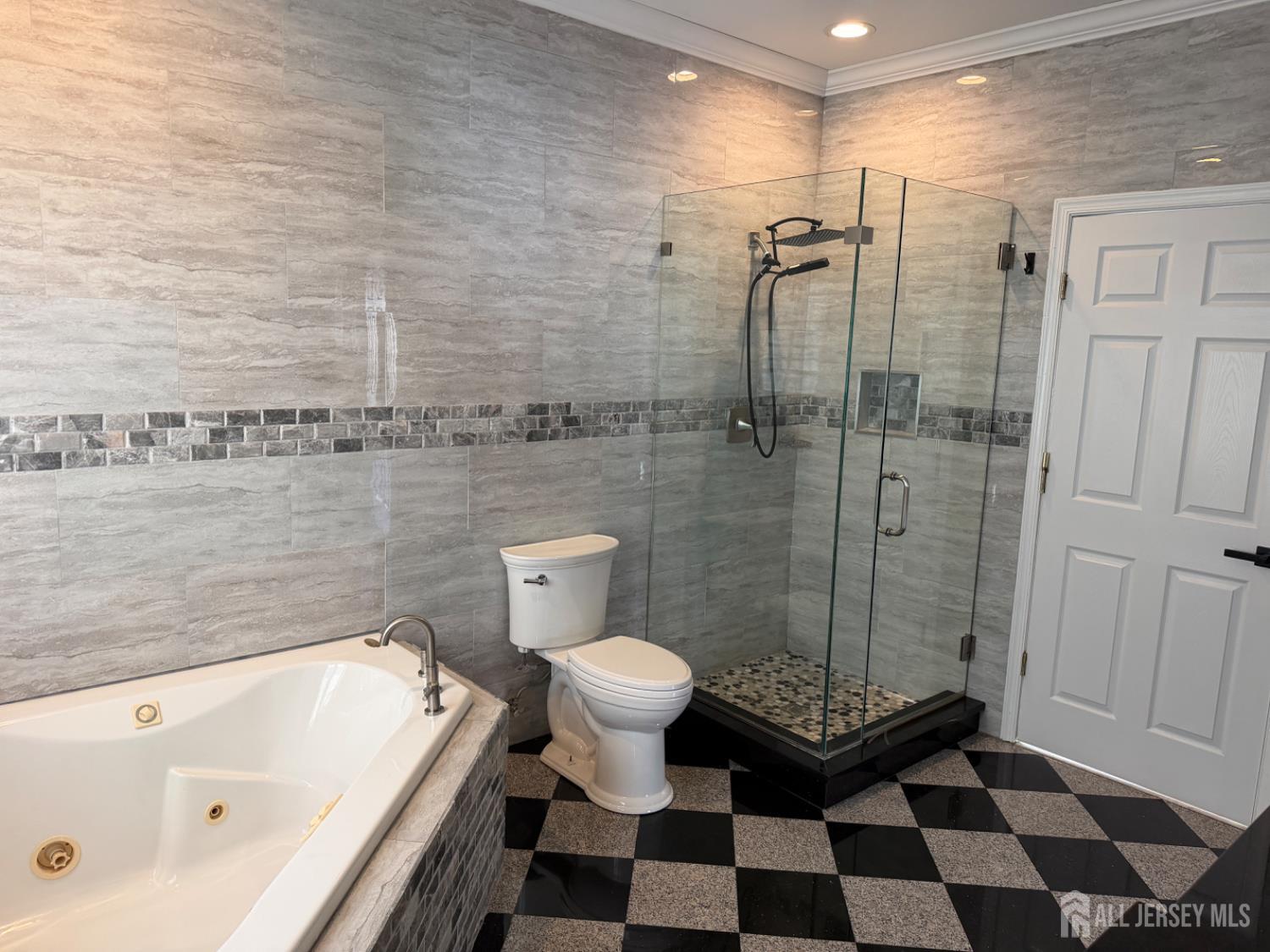 618 Lee Street Perth Amboy, NJ 08861 - Photo 12 of 24 a bathroom with a toilet and a shower