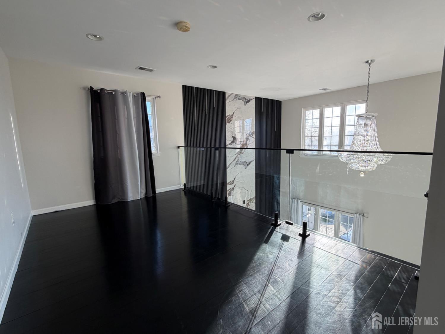 618 Lee Street Perth Amboy, NJ 08861 - Photo 14 of 24 a view of a living room with a flat screen tv