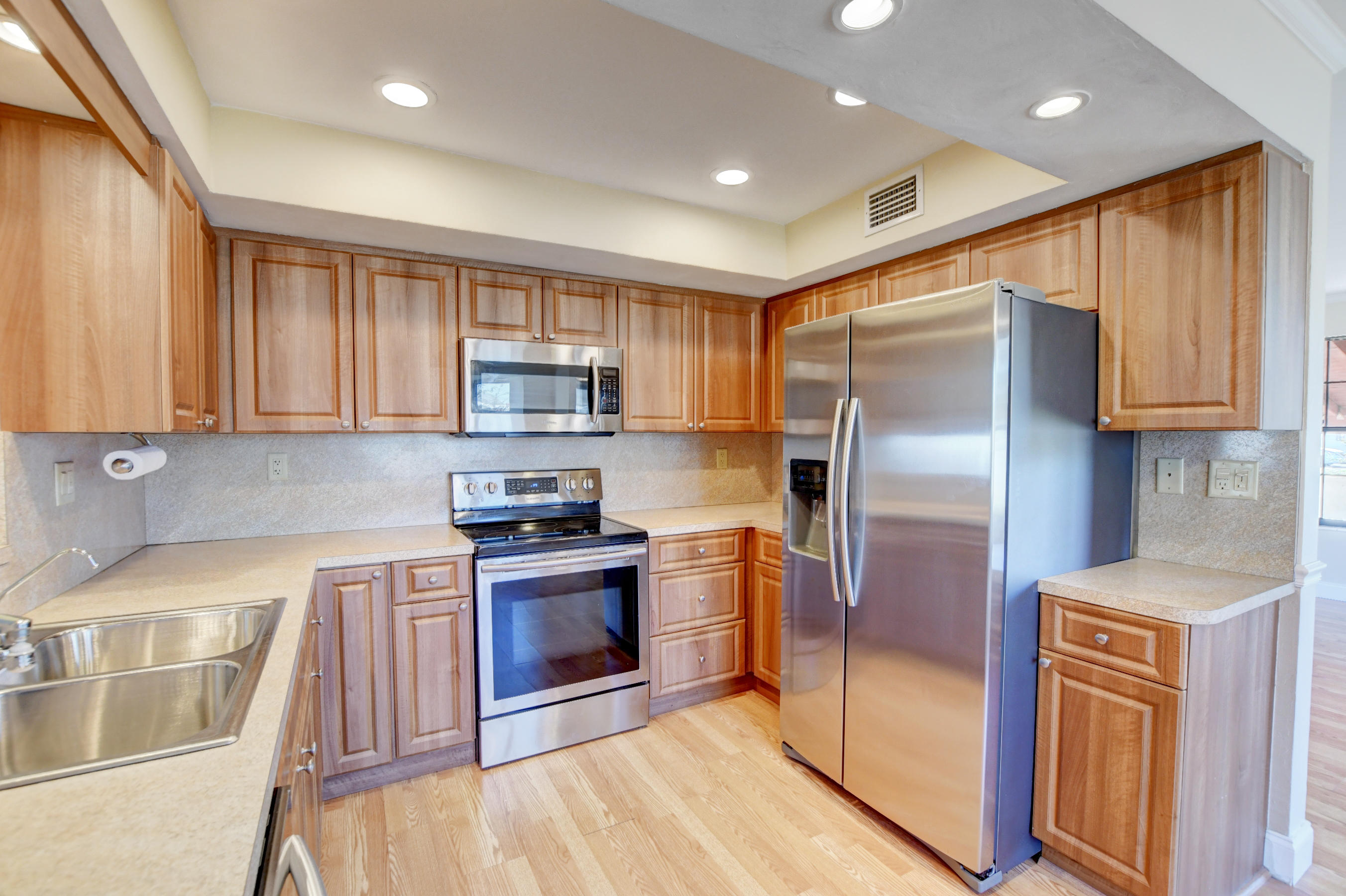 4554 Northeast 4th Avenue Boca Raton, FL 33431 - Photo 13 of 37 13_Well-lit kitchen and newer appliances