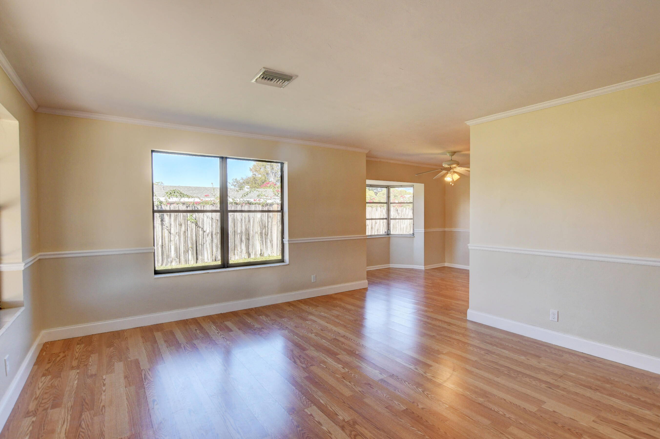 4554 Northeast 4th Avenue Boca Raton, FL 33431 - Photo 6 of 37 06_Bright living room and dining area