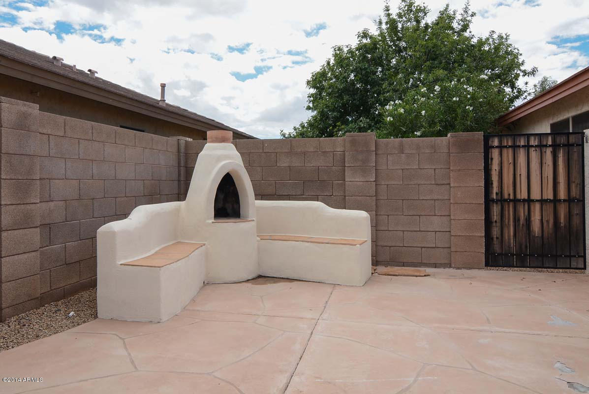 6414 West Escuda Road Glendale, AZ 85308 - Photo 23 of 27 Kiva Fireplace