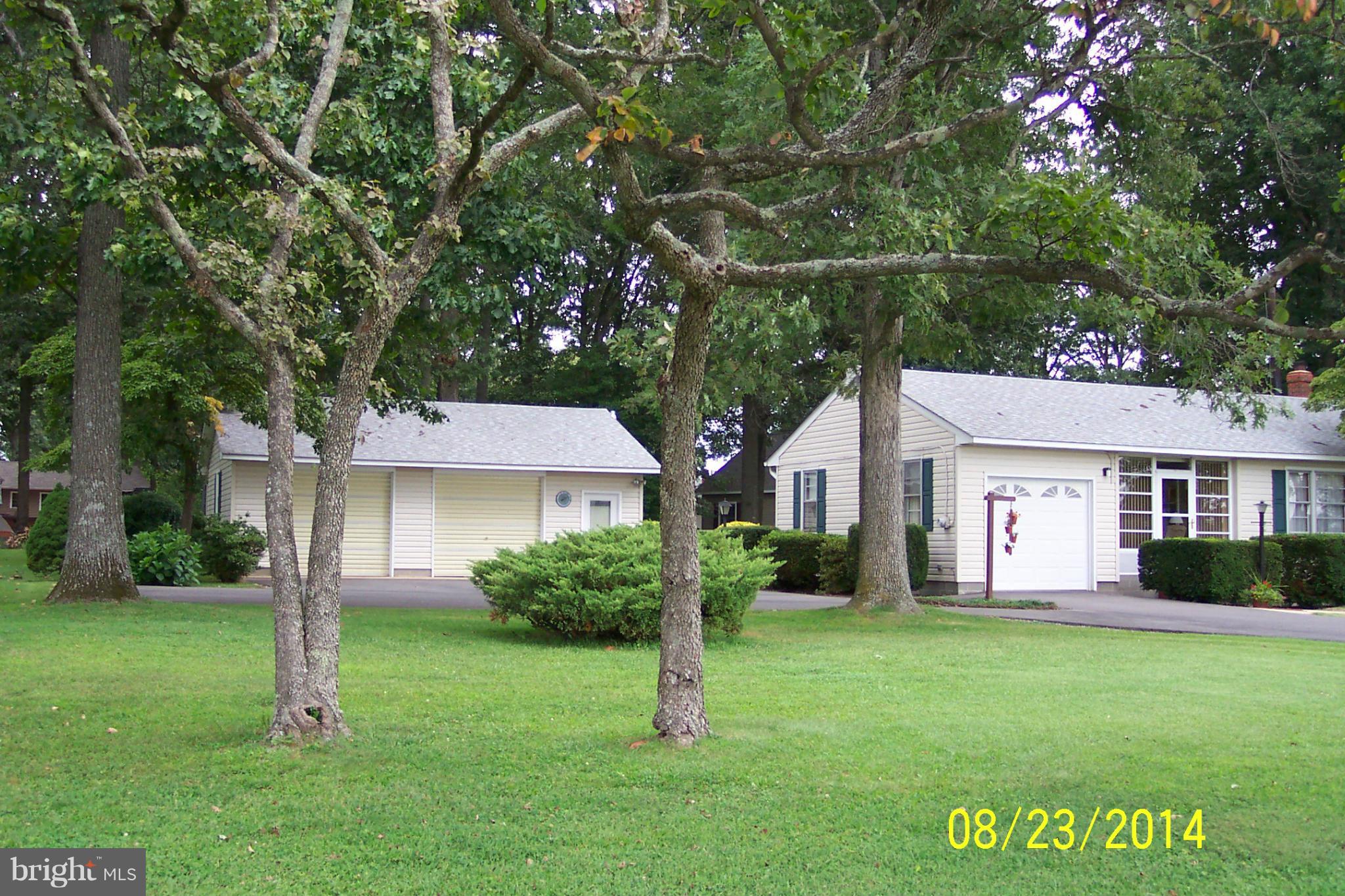 5884 Cloverdale Road Hurlock, MD 21643 - Photo 4 of 26 a view of a house with a yard