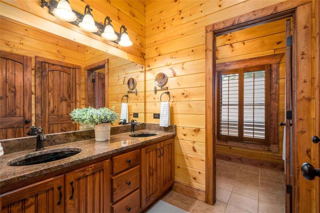 31 High Cliff Road Jasper, GA 30143 - Photo 21 of 50 a bathroom with a sink and a mirror