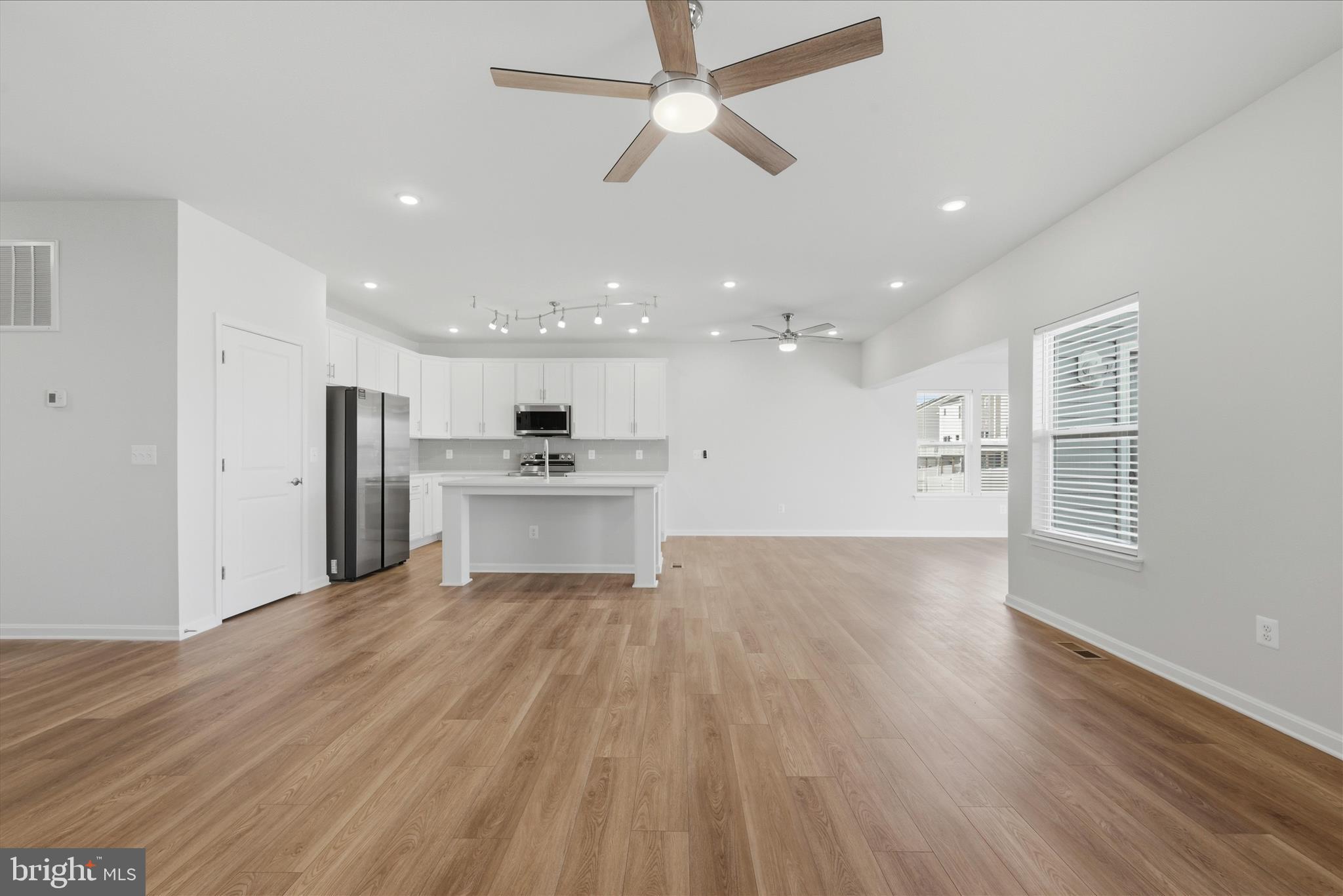 148 Huntwell W Avenue Ranson, WV 25438 - Photo 4 of 20 Living to Kitchen