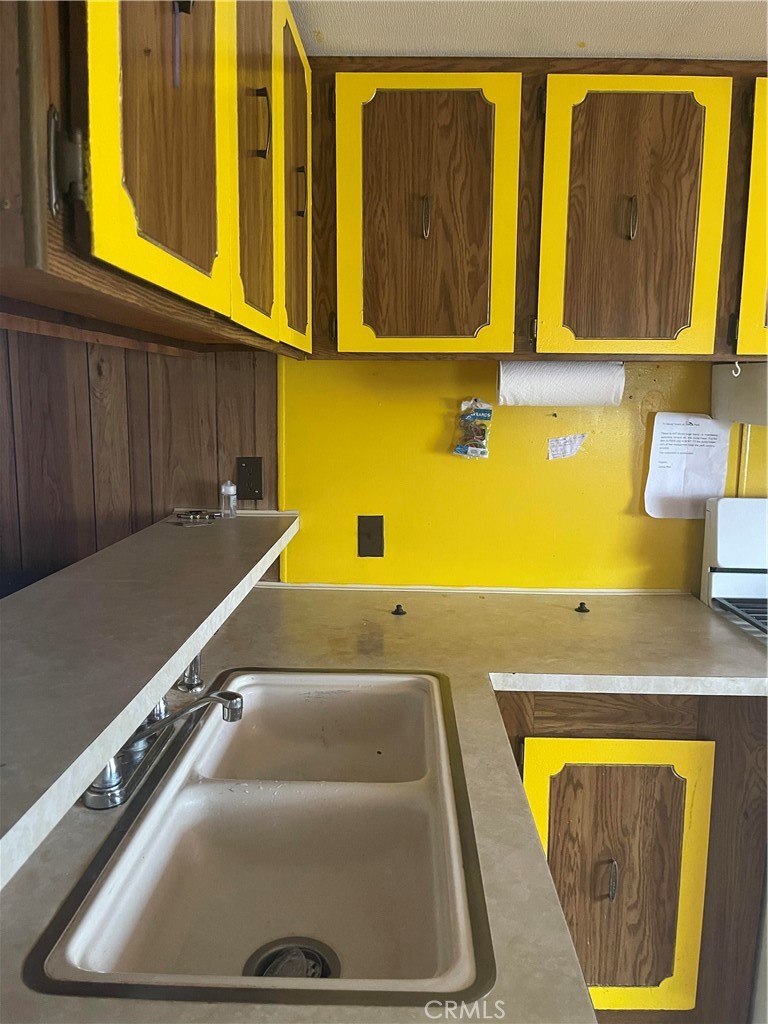 26611 Nudgent Street, Unit 28 Boron, CA 93516 - Photo 3 of 12 a bathroom with a sink and a mirror