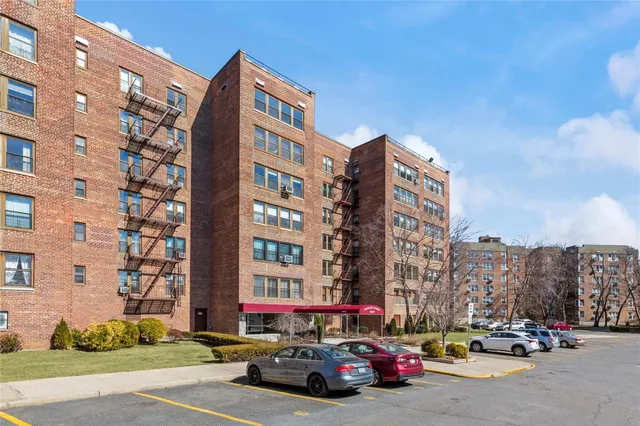 a cars parked in front of a building