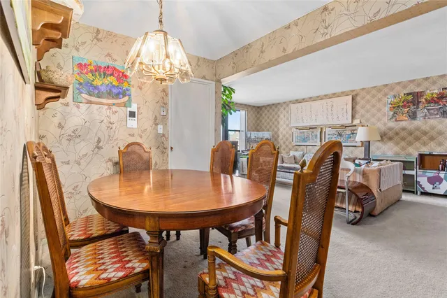 a view of a dining room with furniture