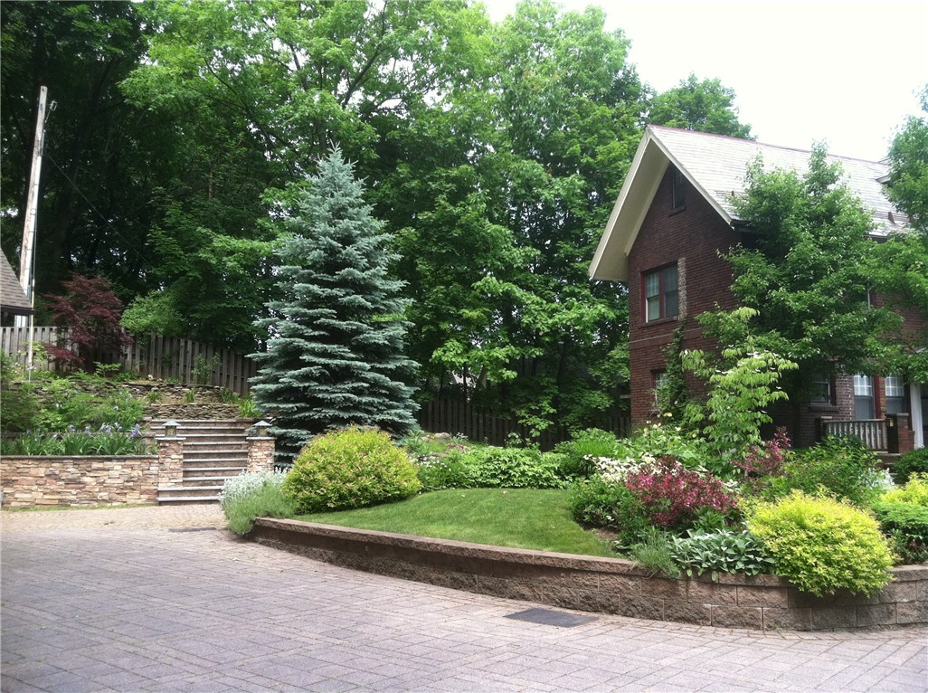 144 Pinnacle Road Rochester, NY 14620 - Photo 4 of 29 Glorious serene setting with lush gardens, paver