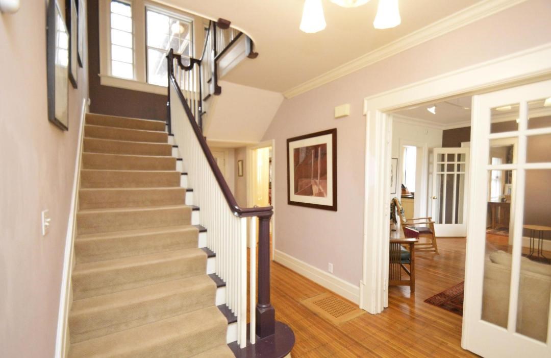 144 Pinnacle Road Rochester, NY 14620 - Photo 9 of 29 Foyer area and stairs to second level. Hard wood