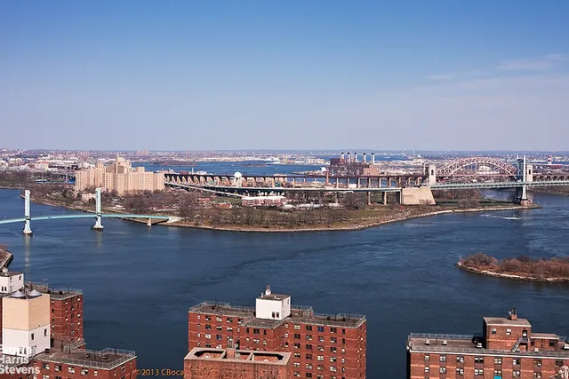 a view of a city with tall buildings