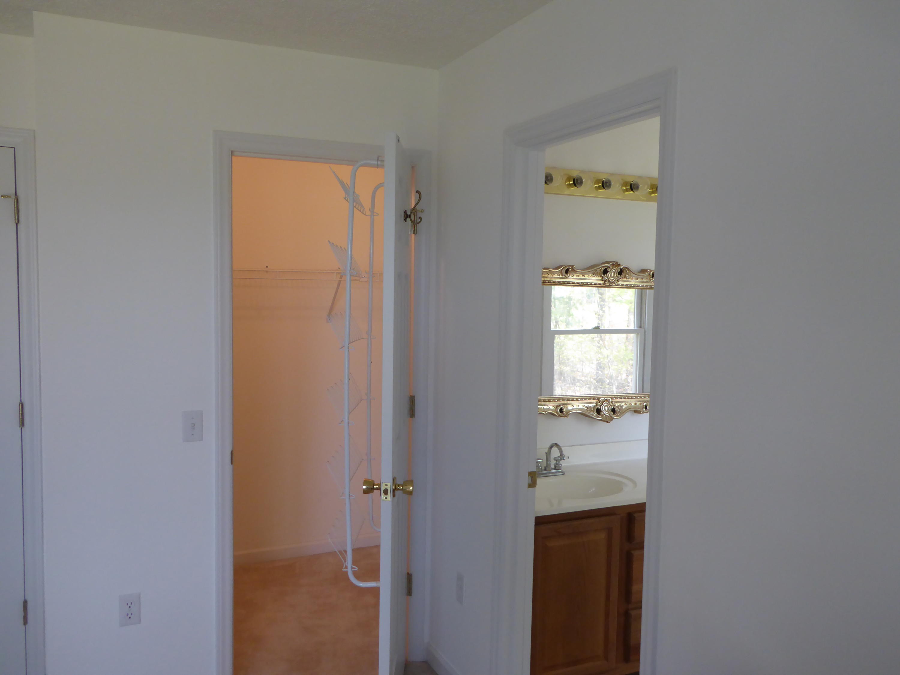 2420 Hardy Road Hardy, VA 24101 - Photo 6 of 19 a en suite bathroom with a granite countertop sink and a mirror