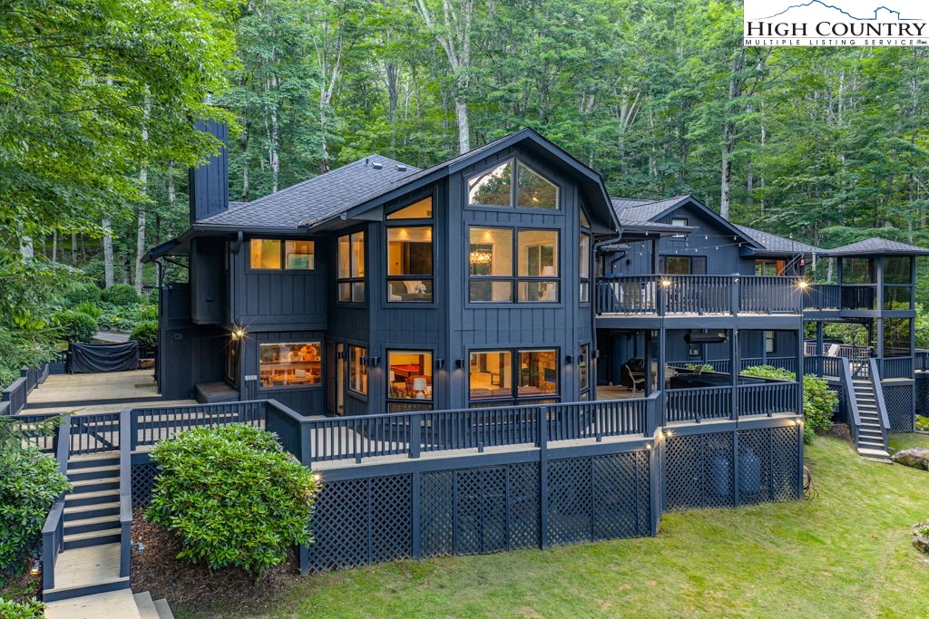 102 Ridge Drive Linville, NC 28646 - Photo 2 of 48 a front view of a house with balcony