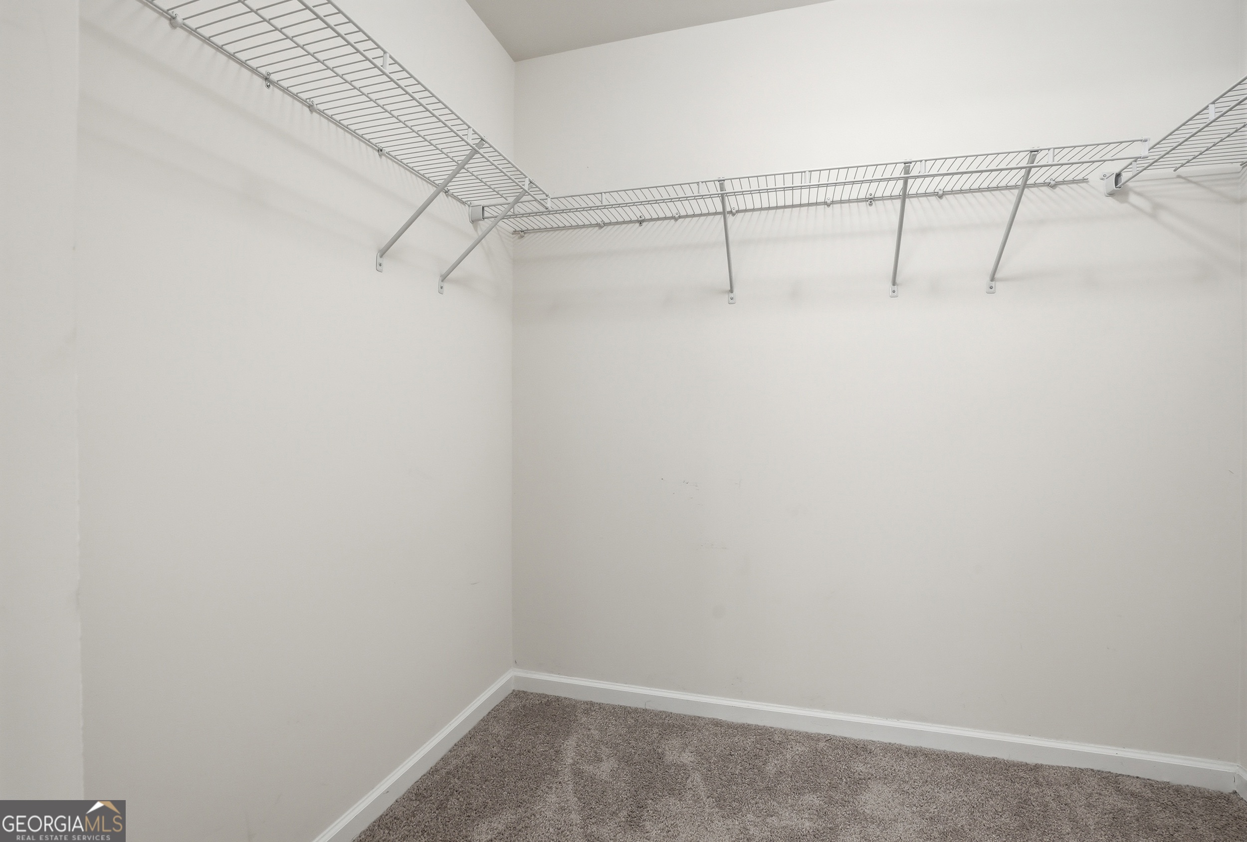 225 Rendell Lane Hinesville, GA 31313 - Photo 26 of 33 a view of a room with racks on the wall