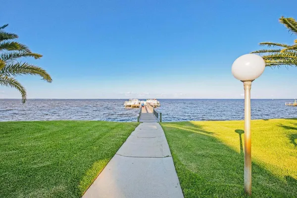 a view of a chairs and table in the room